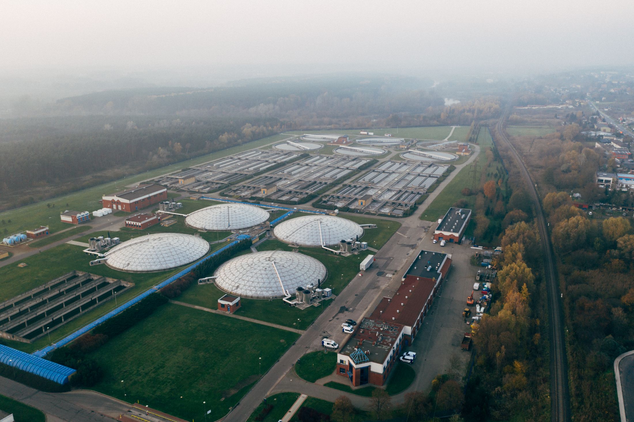 Aerial view of clarifier basins at a wastewater treatment facility